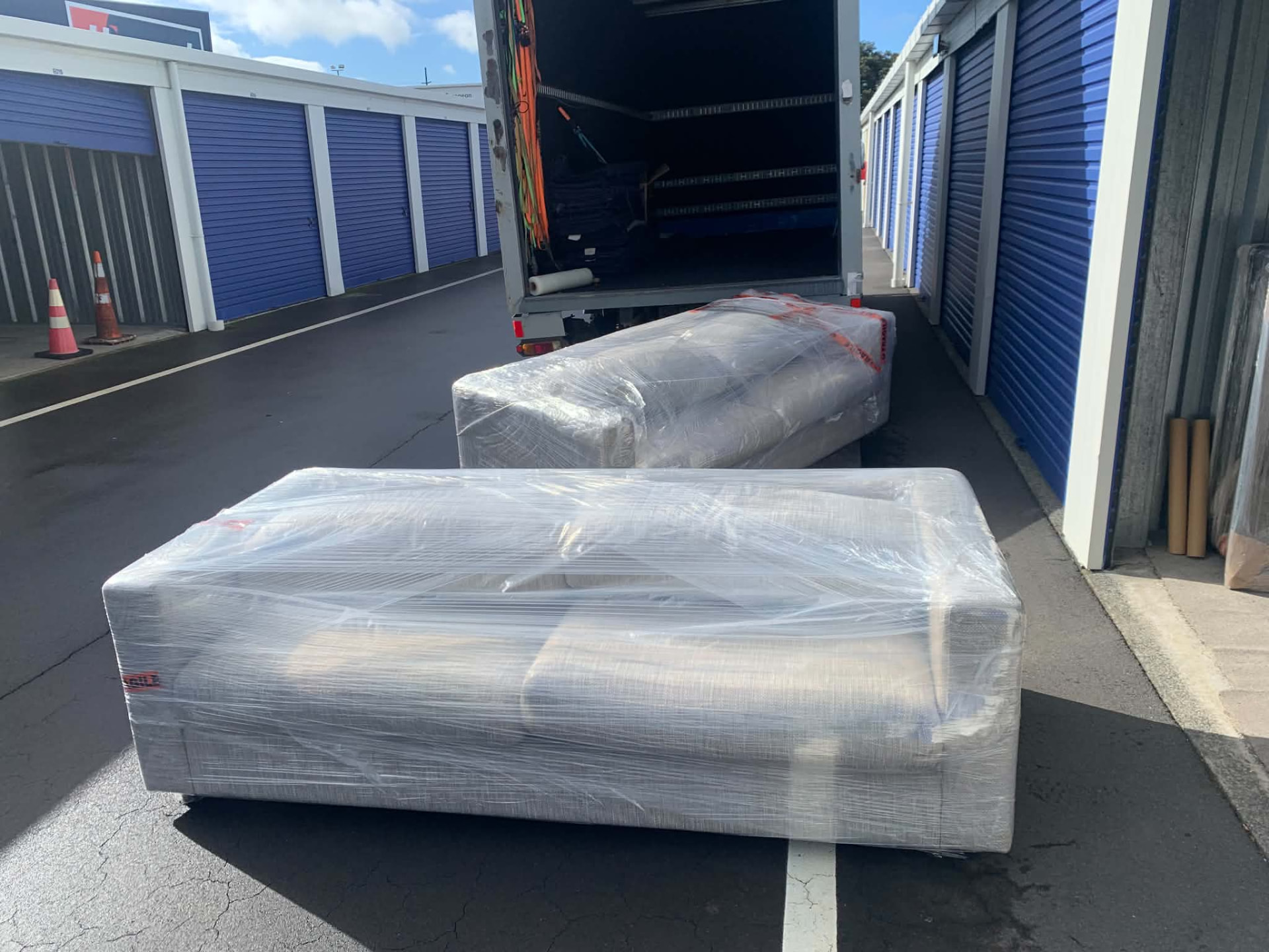 Wrapped furniture ready to be moved from storage